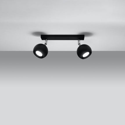 Plafonnier oculaire 2 spots orientables noir installé dans une pièce lumineuse