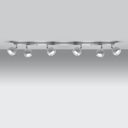 Plafonnier oculaire 6 spots orientables blanc installé dans une pièce lumineuse