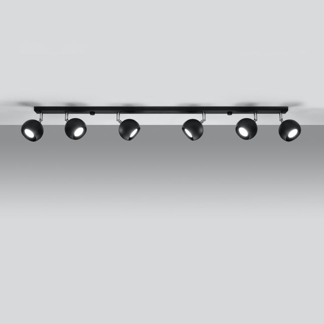 Plafonnier oculaire 6 spots orientables noir installé dans une pièce lumineuse
