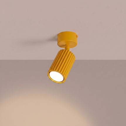 Plafonnier Oslo 1 spot orientable jaune ambré, lumière allumée