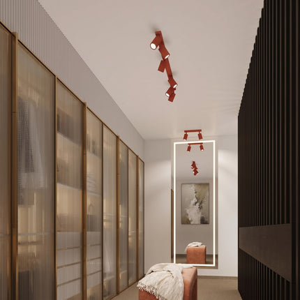 Plafonnier Oslo 1 spot orientable rouge vif dans un intérieur contemporain