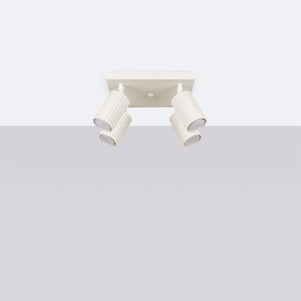Plafonnier Oslo 4 beige, vue en angle montrant l'orientation des quatre têtes cylindriques