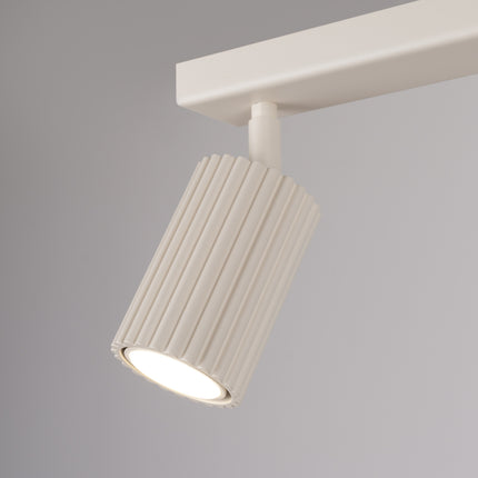 Plafonnier Oslo barre 2 spots orientables 30 cm beige, détail des cannelures