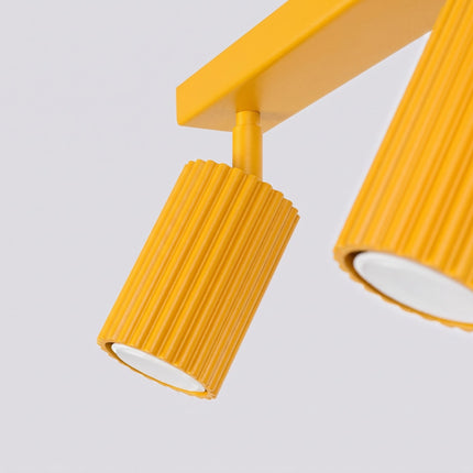 Plafonnier Oslo barre 2 spots orientables 30 cm jaune ambré, détail des cannelures
