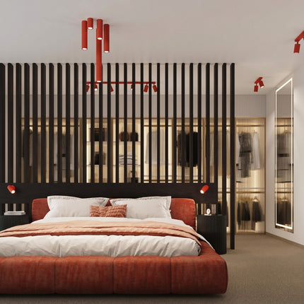 Plafonnier Oslo barre 2 spots orientables 30 cm rouge vif dans une pièce à vivre