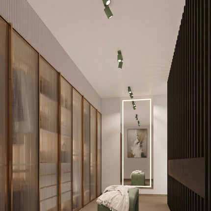 Plafonnier Oslo barre 2 spots orientables 30 cm vert sauge dans un intérieur contemporain
