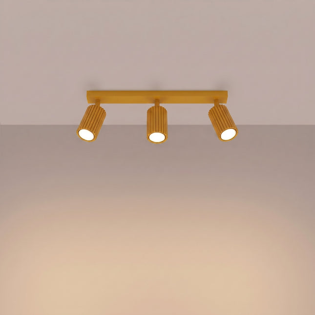 Plafonnier Oslo barre 3 spots orientables 45 cm jaune ambré, lumière allumée