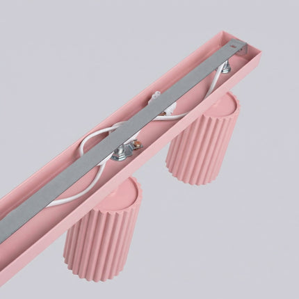 Plafonnier Oslo Barre 4 Spots Orientables 81 cm en Aluminium Rose Poudré, vue de détail
