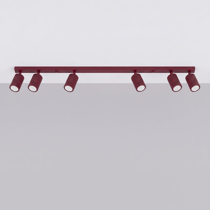 Plafonnier Oslo barre 6 spots orientables 117 cm bordeaux, vue en situation sur fond clair