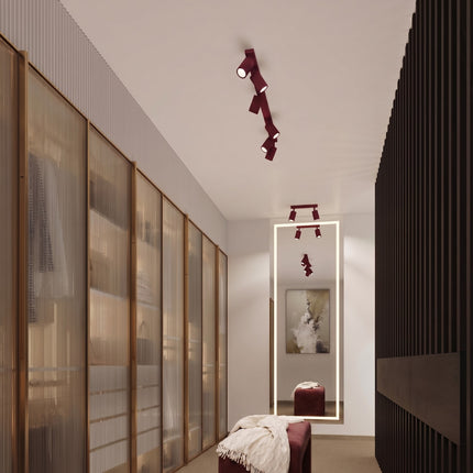 Plafonnier Oslo barre 6 spots orientables 117 cm bordeaux au-dessus d'un plan de travail