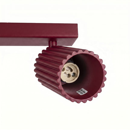 Plafonnier Oslo barre 6 spots orientables 117 cm bordeaux, détail des cannelures