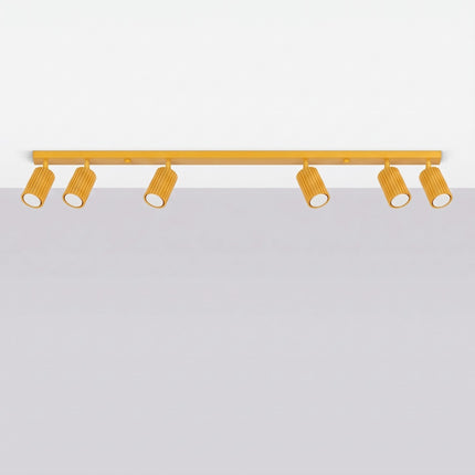 Plafonnier Oslo barre 6 spots orientables 117 cm jaune ambré, vue en situation sur fond clair