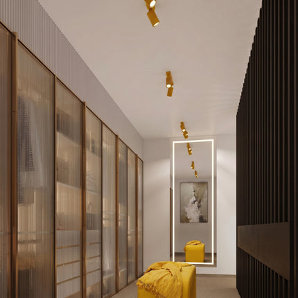 Plafonnier Oslo barre 6 spots orientables 117 cm jaune ambré dans un intérieur contemporain