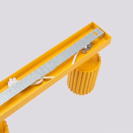 Plafonnier Oslo barre 6 spots orientables 117 cm jaune ambré, vue de détail