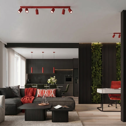 Plafonnier Oslo barre 6 spots orientables 117 cm rouge vif dans une pièce à vivre