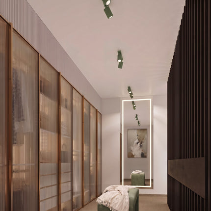 Plafonnier Oslo barre 6 spots orientables 117 cm vert sauge dans un intérieur contemporain