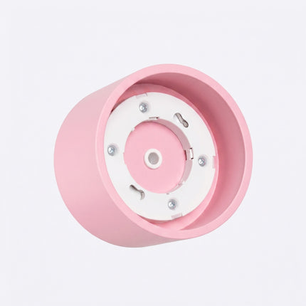 Plafonnier Pastille rose poudré, vue sur fond coloré