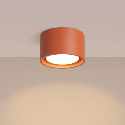 Plafonnier Pastille rouge ocre, lumière allumée