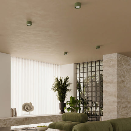 Plafonnier Pastille vert olive, au-dessus d'un plan de travail