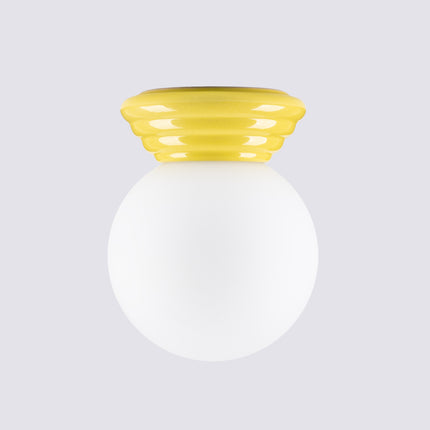 plafonnier perle céramique jaune ambré ip44, détail de la matière