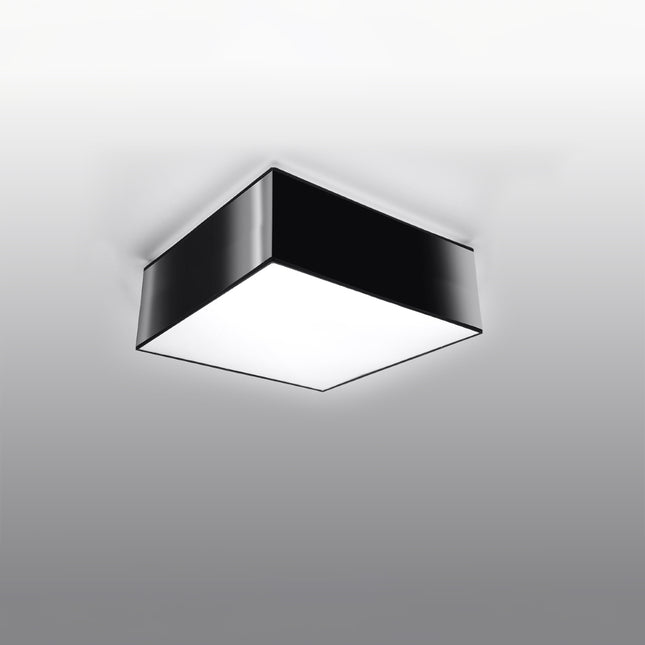 Plafonnier Plateforme carré 25 noir au plafond d'un salon