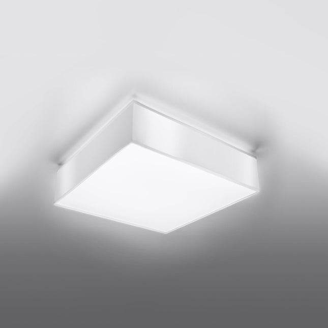 Plafonnier Plateforme carré 35 blanc au plafond d'un salon