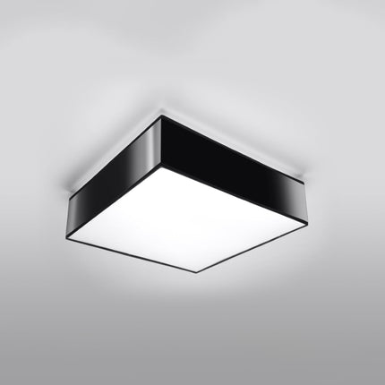 Plafonnier Plateforme carré 35 noir au plafond d'un salon