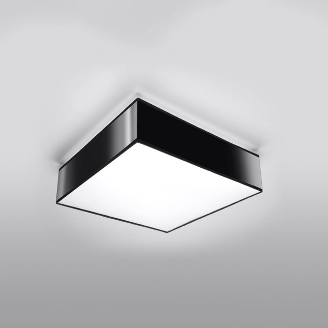 Plafonnier Plateforme carré 35 noir au plafond d'un salon