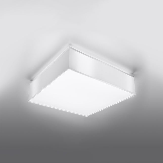 Plafonnier Plateforme carré 45 blanc au plafond d'un salon