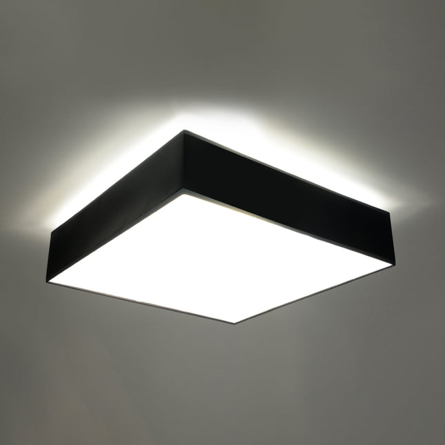 Plafonnier Plateforme carré 45 noir au-dessus d'une table de salle à manger