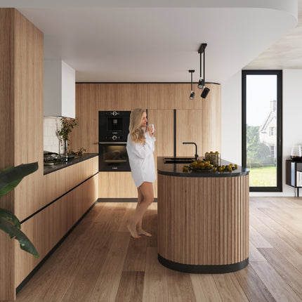 Ambiance lumineuse créée par les deux spots du plafonnier Précision Moderne 2 noir dans un salon