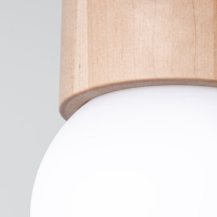 Vue en contre-plongée du plafonnier Pure Bois Naturel installé au plafond