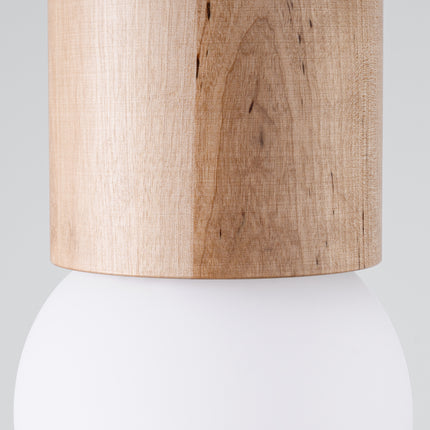 Plafonnier Pure Bois Naturel, cylindre en bois clair et globe blanc, vue de face sur fond gris