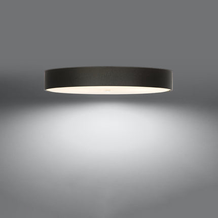 Plafonnier rond en tissu noir de 100 cm, abat-jour tambour et diffuseur en verre, allumé sur fond gris