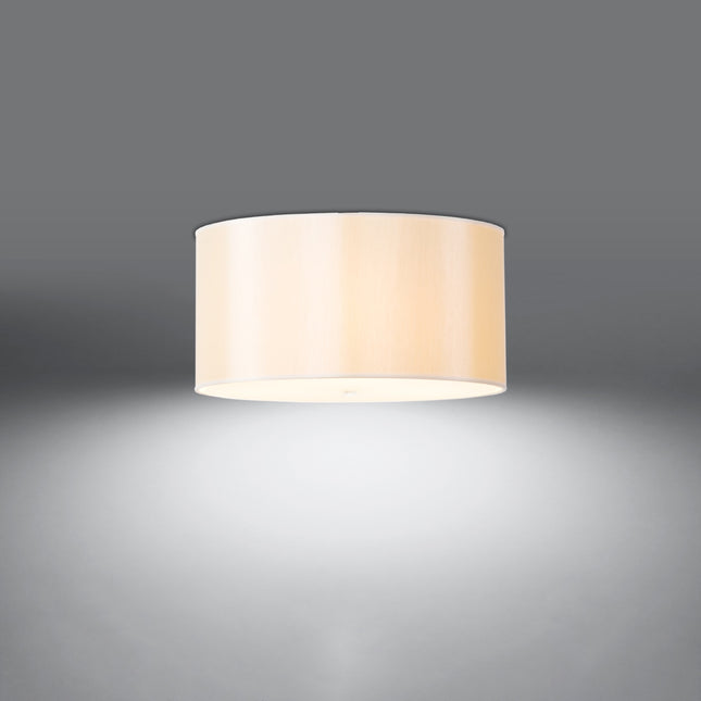 Plafonnier tambour en tissu blanc allumé, diffuseur en verre éclairé sur fond gris
