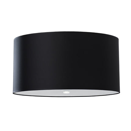 Plafonnier tambour en tissu noir sur fond blanc, diffuseur en verre visible en partie basse