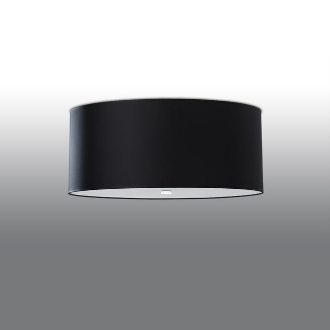 Plafonnier rond en tissu noir de 70 cm monté au ras du plafond, abat-jour cylindrique et diffuseur en verre.