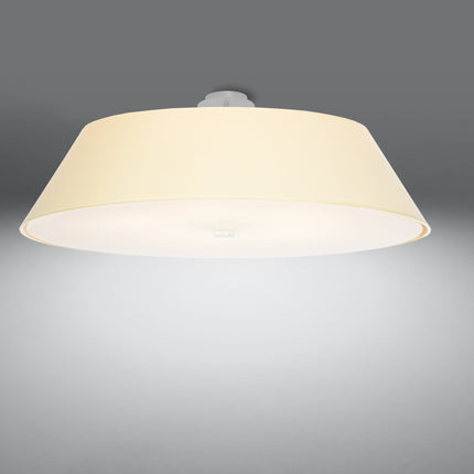 Plafonnier Trapèze en tissu blanc allumé, lumière chaude diffusée à travers le verre