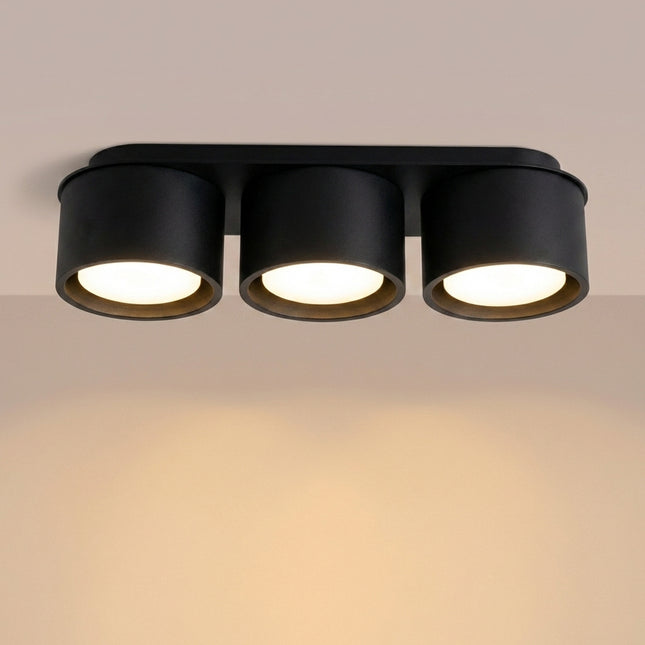Plafón de triple Pastilla negro, luz encendida