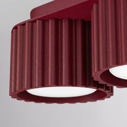 Plafonnier triple spot Aura bordeaux, packshot de trois quarts