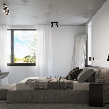 Chambre scandinave avec plafonniers tube orientables noirs et applique assortie
