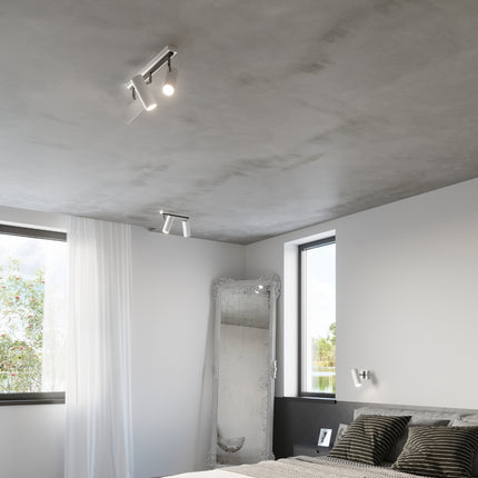 Vue d'ensemble d'une chambre avec plafonnier tube ajustable blanc au plafond