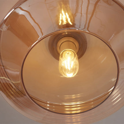 Vue interieure du plafonnier Verona montrant l'ampoule E27 et le verre ambre