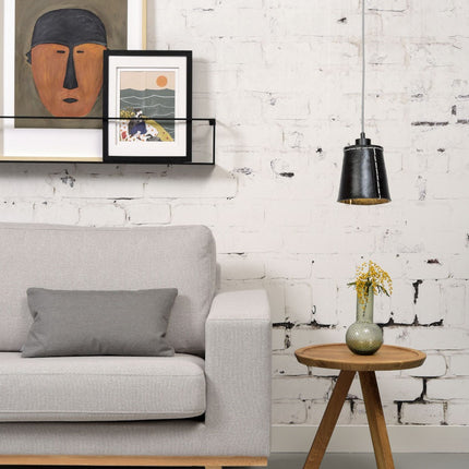 Pendant light Amazon black above a side table in a cozy living room