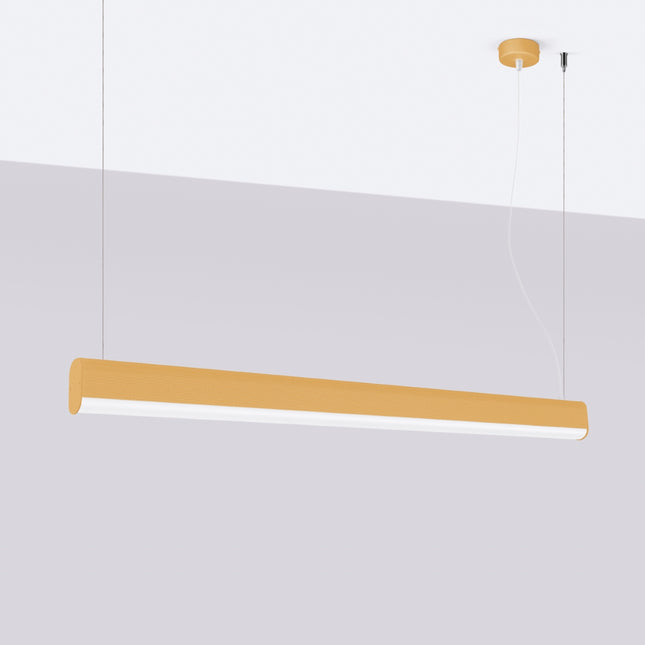 Suspension barre linéaire dorée éteinte devant un mur clair, design minimaliste