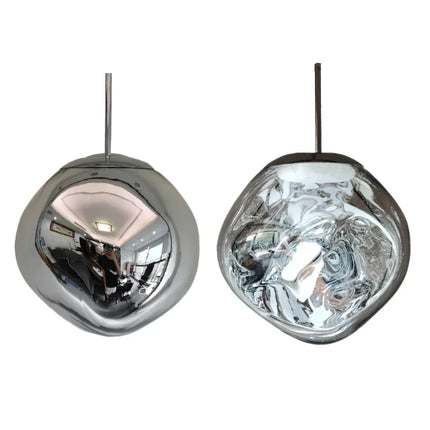 Suspension bulle moderne coloris gris fumé à LED, lumière douce et élégante.