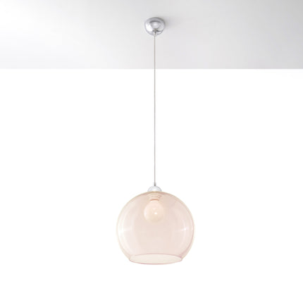 Suspension Bulle en verre champagne au-dessus d'une table à manger