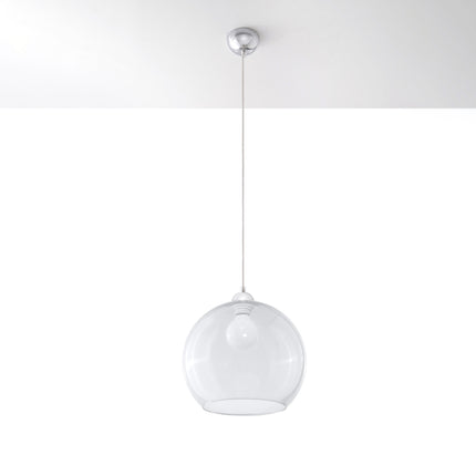 Suspension Bulle en verre transparent au-dessus d'une table à manger