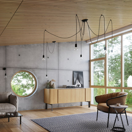 Suspension Câble Minimaliste noire à ampoule E27 apparente dans une ambiance chaleureuse