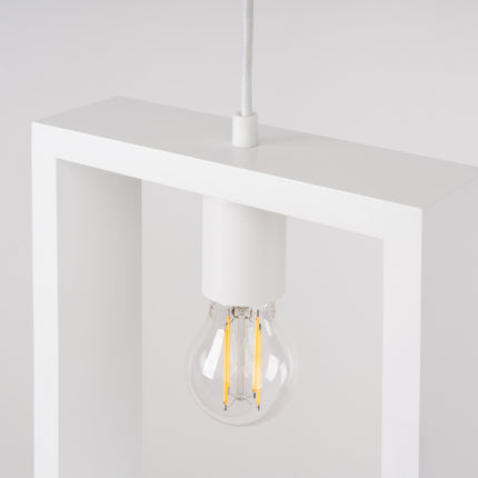 Gros plan sur l'angle du cadre blanc de la suspension Cadre Pure